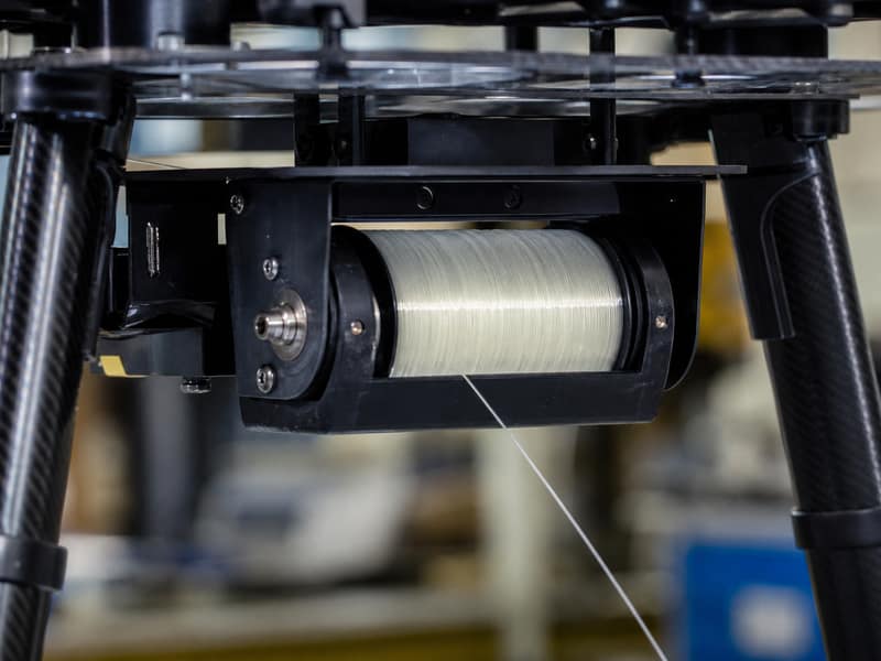 Fiber Optic Dispenser for UAVs mounted on airframe